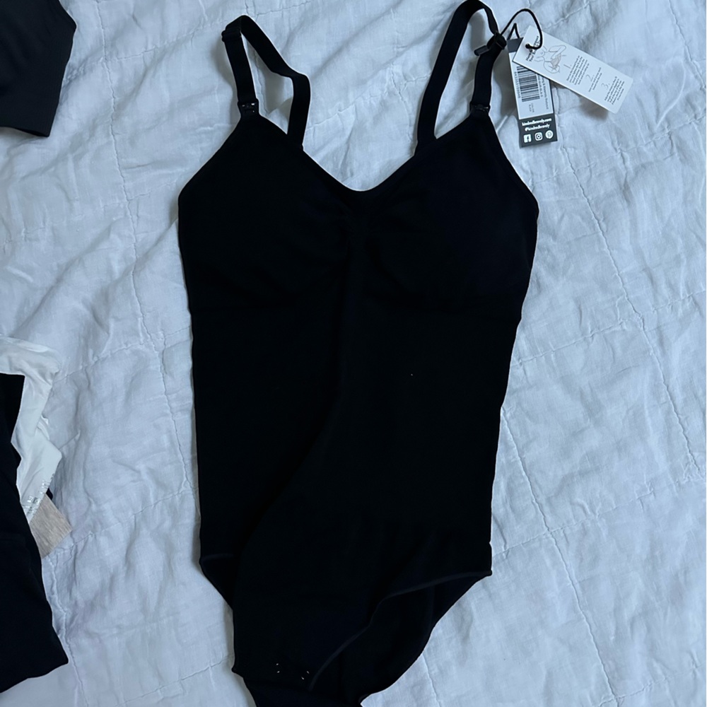 Black kindred bravely nursing and pumping bodysuit.